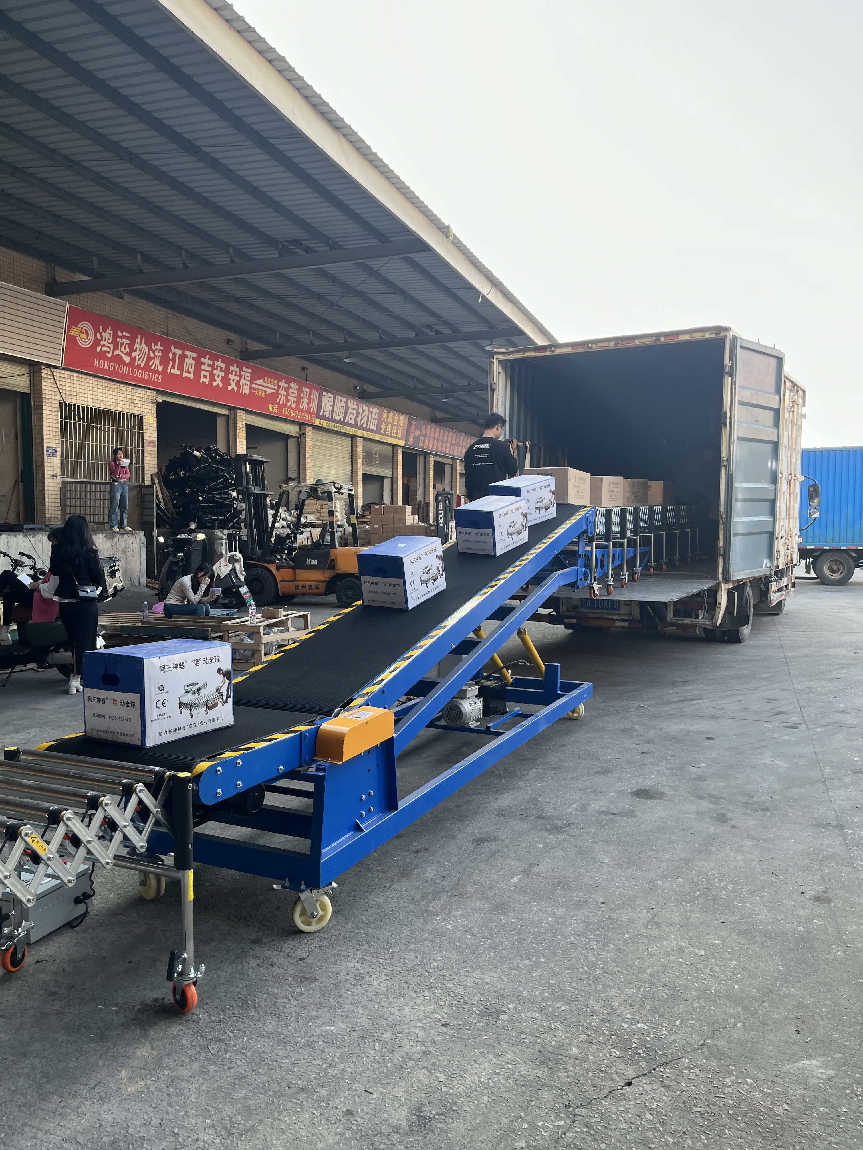 Medium Hydraulic Conveyor + roller conveyor loading and unloading